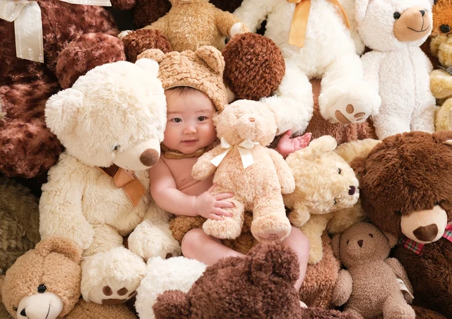 くまの着ぐるみで撮影した子どもの写真 16