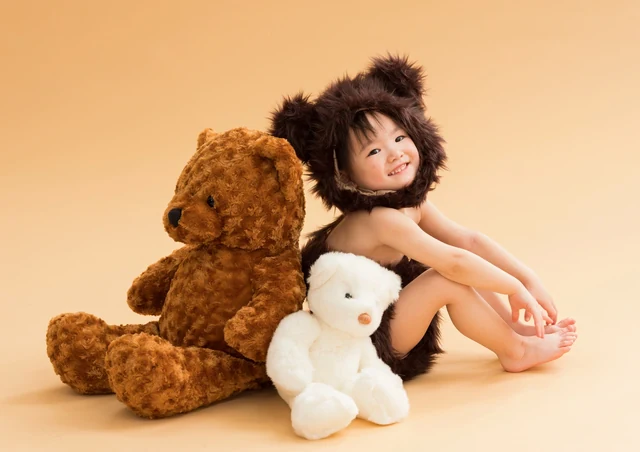 くまの着ぐるみで撮影した子どもの写真 19
